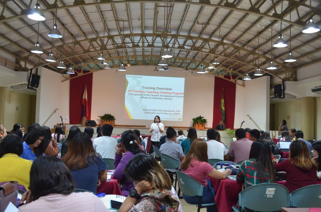 Dr. Melinda dP. Bandalaria, Teacher Development Program Project Leader, led the 21st Century Teaching training of 75 teachers from 13 educational institutions in Quezon at the UPOU CCDL Auditorium, Los Banos, Laguna.