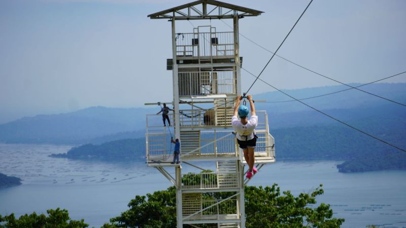 11 July 2023 – Taiwanese LAKBAY fellow, Mr. Ryan Tang riding a zipline overlooking the Taal Volcano.