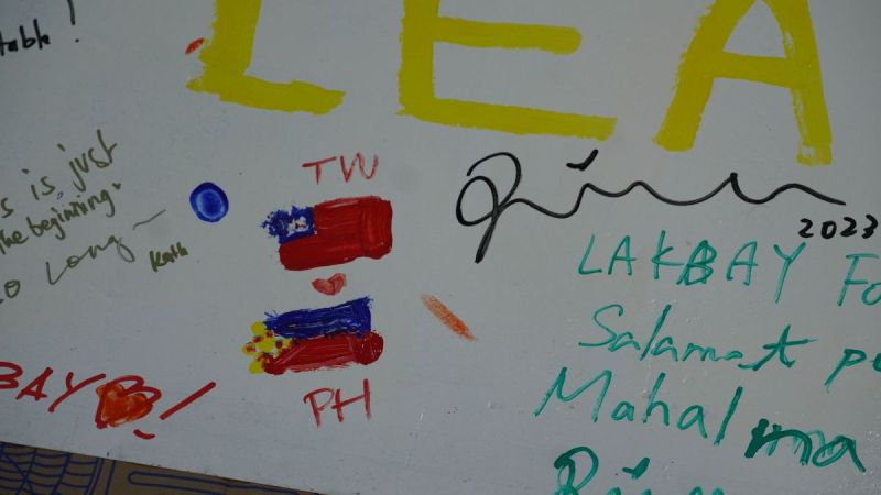 12 July 2023 – Project LAKBAY Freedom Wall with writing, “TW loves PH”