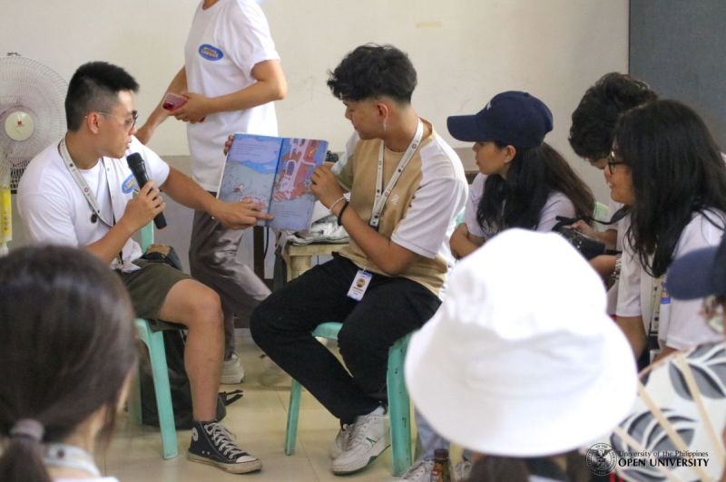 9 July 2023 – Project LAKBAY fellows facilitating a Book Reading Session for the children of Gawad Kalinga LB Ville.