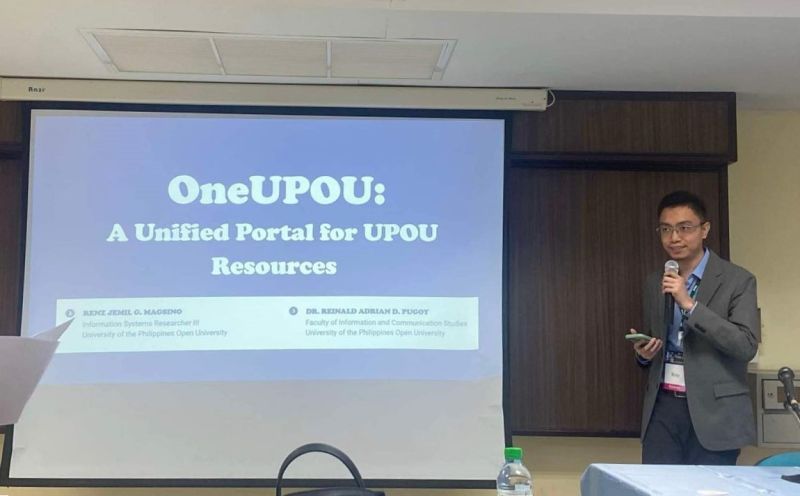 Mr. Renz Jemil Magsino, Information Systems Researcher III, presenting the study “OneUPOU A Unified Portal for UPOU Resources”