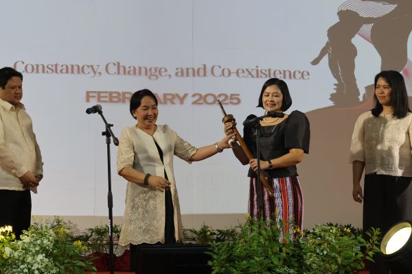 Chancellor Serrano receives the mace from Chancellor Bandalaria.